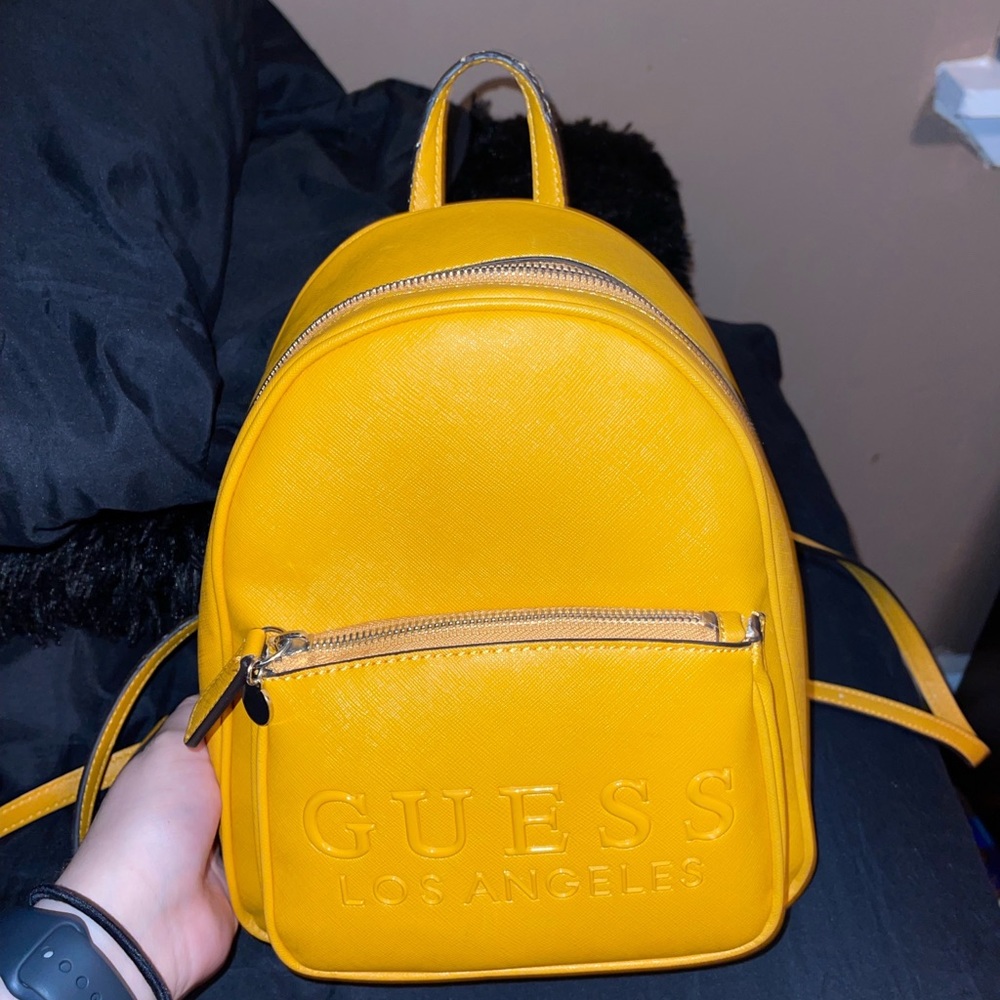 Guess Miniature Backpack Purse. Used but in very good condition